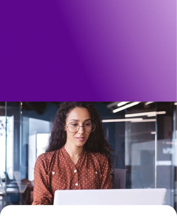 Woman in glasses looking at something
